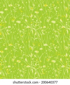 Wild flowers green background.  Seamless green field of wild flowers. 