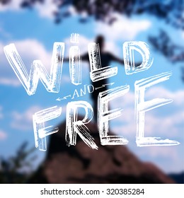 "Wild and Free" - typographic design on a blurred background. EPS 10 file. Used gradient mesh.