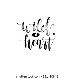 Wild at heart phrase for card. Phrase for Valentine's day. Ink illustration. Modern brush calligraphy. Isolated on white background.