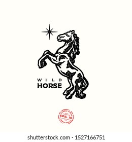 Wild horse logo. Ink stamp designs. Vintage textured sign.