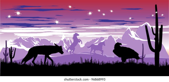 Wild horses and coyote in the steppes of Argentina in the twilight