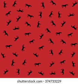 Wild horses on a red background