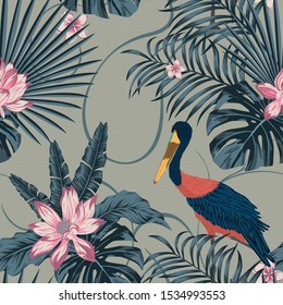 Wild jungle tropical island painted in abstract color. Beautiful rare bird stork in uncommon exclusive color. Seamless illustration consisting of realistic vector. Repeat pattern for your best design.