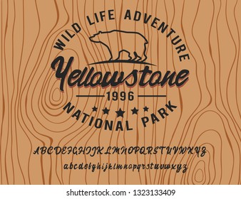 Wild life adventure. Yellowstone national park. Retro style. Handmade script font. Hipster style. Camping logo. Retro and vintage hadmade logo. Print on clothes, sticker.