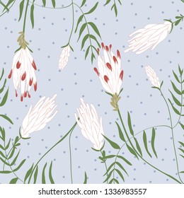 Wild meadow floral seamless pattern. Blooming botanical motifs scattered random. Color vector texture. Fashion, fabric, wallpaper, print. Hand drawn blossom flowers on blue background with polka dots