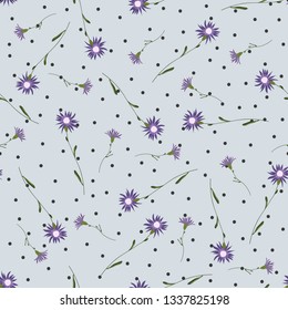 Wild meadow floral seamless pattern. Blooming botanical motifs scattered random. Colorful vector texture. Fashion, fabric, wallpaper, print. Hand drawn blossom flowers on blue polka dots background