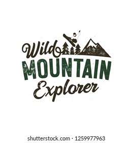 Wild Muntain Explorer Badge with snowboarder, mountains and trees. Nice for outdoor enthusiasts gift, for t-shirt, mug, poster, other print. Stock vector isolated on white.