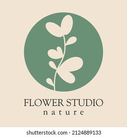 Wild Plant Logo. Round Emblem Flower In A Circle. Floral Decoration. Organic Design Template. Vector Abstract Icon For Flower Shop Design, Cosmetics, Beauty, Perfume, Spa, Yoga.