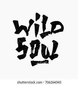 Wild soul. Ink hand lettering. Modern brush calligraphy. Handwritten phrase. Inspiration graphic design typography element. Rough simple vector sign.