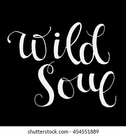 Wild soul phrase.Modern brush calligraphy. Hand drawn lettering background. Vector illustration. Isolated on black background.
