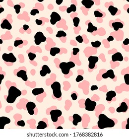 Wild spotted skin or fur texture seamless pattern. Animalistic design. Vector illustration background. Pastel creamy colored wallpaper.	