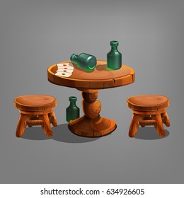 Wild west decoration - wooden table with chair, alcohol bottle and playing cards.