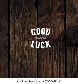 Wild west styled "Good Luck" message on wooden board