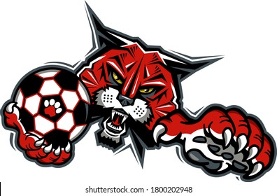 wildcat soccer team mascot holding ball for school, college or league