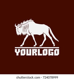 wildebeest logo sign vector illustration on brown background