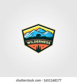 wilderness mountain adventure badge vintage logo vector illustration