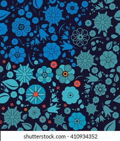 Wildflowers with leaves and berries. A seamless pattern of blue, red and orange flowers and leaves on a dark blue background.
