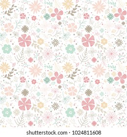 Wildflowers seamless pattern. Small hand drawn flowers, daisies, leaves, branches on white background. Cute vector design for liberty prints, floral banner, wallpaper, wrapping, scrapbooking, cards.