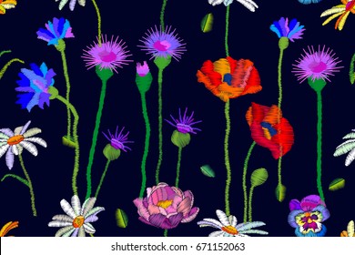 Wildflowers summer blossom. Seamless vector pattern with thistles, chamomiles, poppies and cornflowers. Stylized embroidered texture. Summer textile collection.