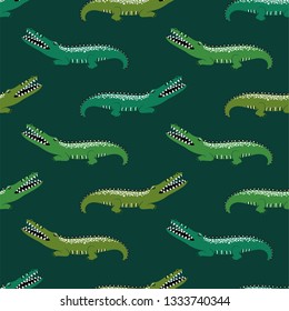 Wildlife animals print. Seamless pattern with funny crocodiles on a green background.