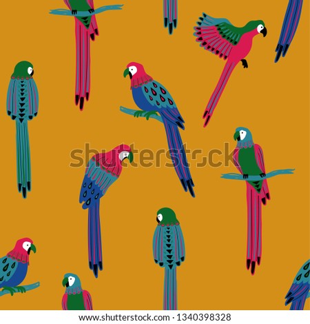 Wildlife birds print. Seamless pattern with colorful parrots on a yellow background.
