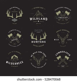 wildlife hunters, hipster invert logo set with deer antlers, axe and mountains