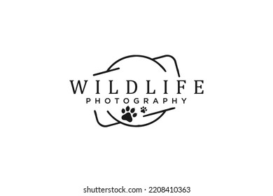 Diseño del logo de la fotografía de vida silvestre con símbolo de la garra de pata