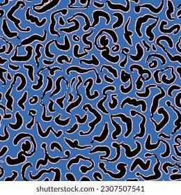 Wildlife safari animal seamless repeat pattern. Random placed, abstract vector shapes all over surface print on blue background.