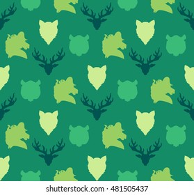 Wildlife seamless pattern. Zoo ornament for print, fabric, cloth, child items and wrap. Nature fauna wallpaper. Silhouettes head animals background. Vector