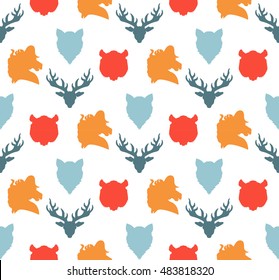 Wildlife seamless pattern. Zoo ornament for print, fabric, cloth, child items and wrap. Nature fauna wallpaper. Silhouettes head animals background. Vector