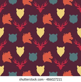 Wildlife seamless pattern. Zoo ornament for print, fabric, cloth, child items and wrap. Nature fauna wallpaper. Silhouettes head animals background. Vector