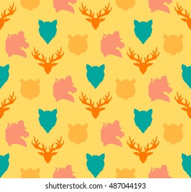 Wildlife seamless pattern. Zoo ornament for print, fabric, cloth, child items and wrap. Nature fauna wallpaper. Silhouettes head animals background. Vector