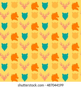 Wildlife seamless pattern. Zoo ornament for print, fabric, cloth, child items and wrap. Nature fauna wallpaper. Silhouettes head animals background. Vector