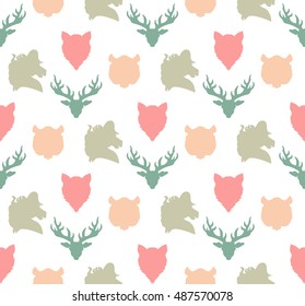 Wildlife seamless pattern. Zoo ornament for print, fabric, cloth, child items and wrap. Nature fauna wallpaper. Silhouettes head animals background. Vector