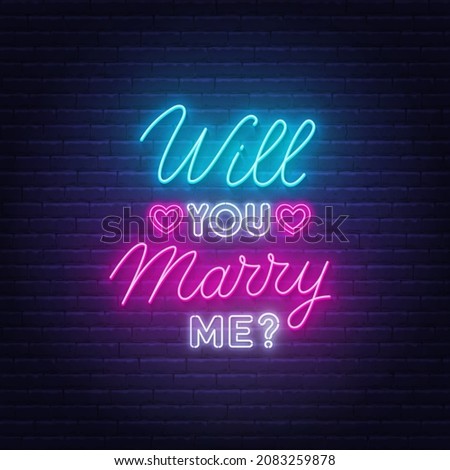 Will You Marry Me neon lettering on brick wall background.