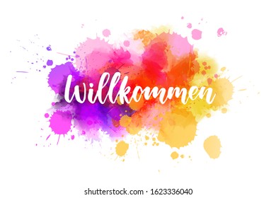 Willkommen (Welcome in German language). Handwritten modern calligraphy lettering on colorful watercolor paint splashes. Purple, pink and orange colored. 