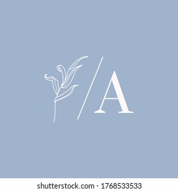 Willow branch with leaves monogram in simple minimal linear style. Abstract Feminine Vector Logo with Floral Illustration for Beauty Studio, SPA salon, Organic cosmetics, wedding