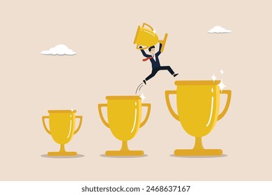 Win or achievement to motivate to achieve bigger goal, victory or win award concept, confident businessman jumping from small win trophy to get bigger one.