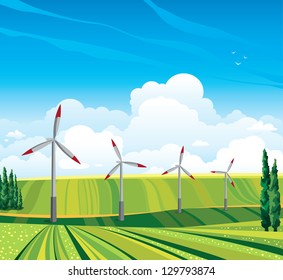 Wind generator and green meadow on a blue sky with clouds. Summer rural landscape.