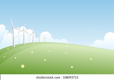 Wind generators on a green field.