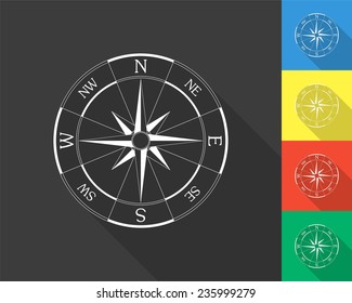 wind rose compass icon - gray and colored (blue, yellow, red, green) vector illustration with long shadow