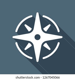 Wind rose, compass with star, icon. White flat icon with long shadow on blue background