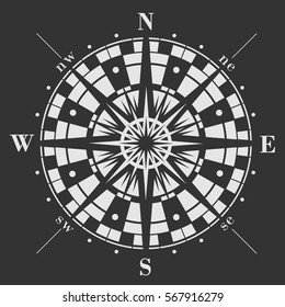 Wind rose icon on black background. Vector compass illustration.