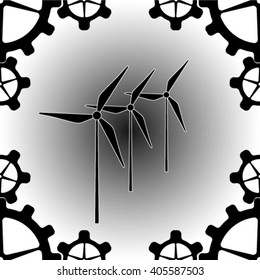 Wind turbines with light background.