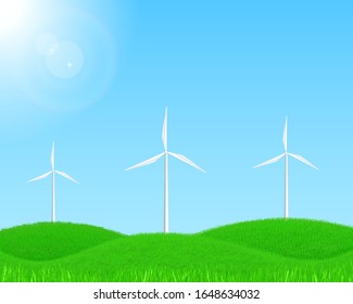 Wind turbines on green grassy field, with sunshine. Wind energy environmental concept.