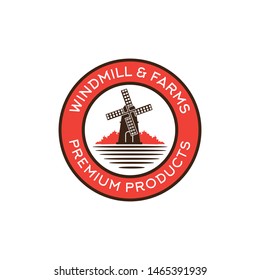 Windmill circle seal logo design with red bush illustration on the side
