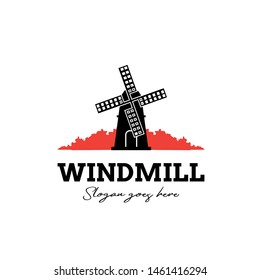 Windmill graphic with red plants farm logo design