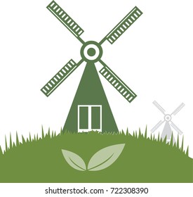 Windmill and the green grass field
