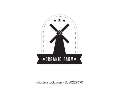 Ilustración vectorial del logotipo del molino de viento Emblema de panadería sobre fondo oscuro