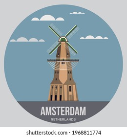 windmill on the river bank of the city of Amsterdam in the Netherlands
